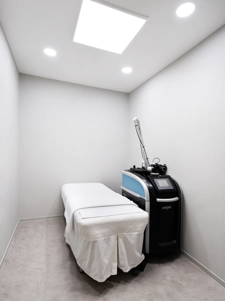 Treatment room with laser device, Wells Clinic